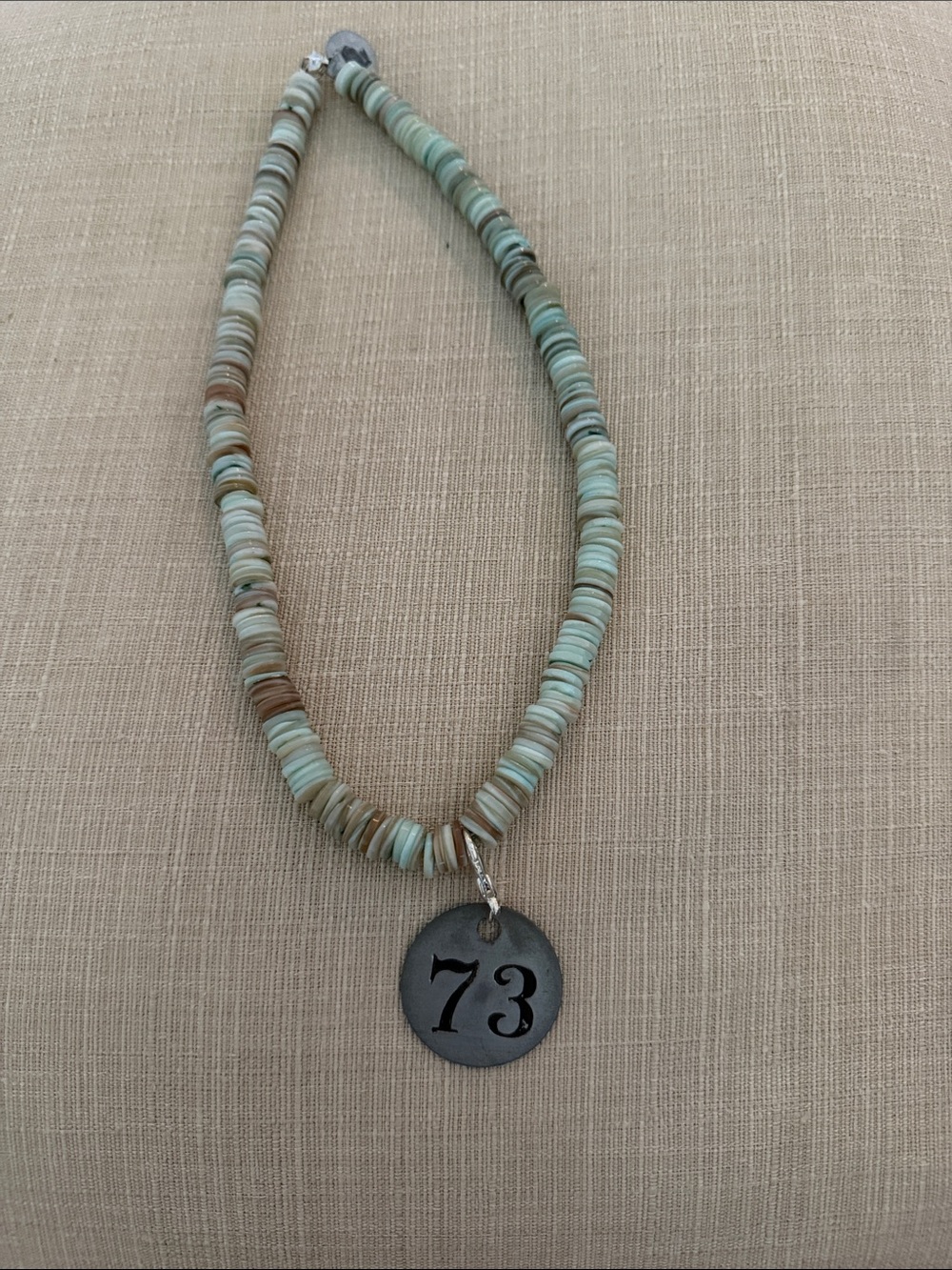 Handmade one of a kind 16 inch turquoise Heishi Beaded Necklace with '73' Charm